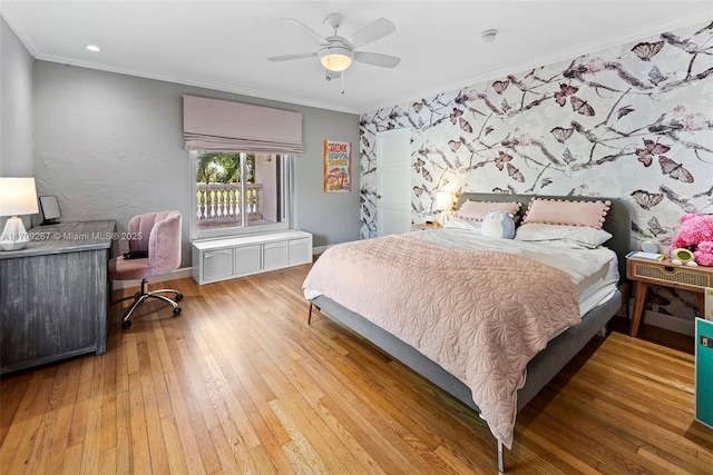 bedroom with wood-type flooring, a ceiling fan, and crown molding