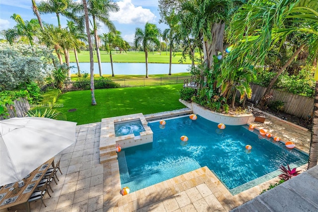 view of pool with a water view, a lawn, a fenced backyard, and a patio area