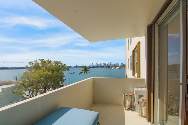 balcony featuring a water view