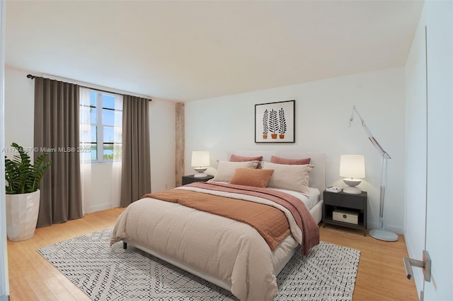 bedroom featuring light hardwood / wood-style flooring