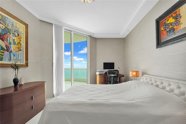 bedroom featuring crown molding, floor to ceiling windows, and access to outside