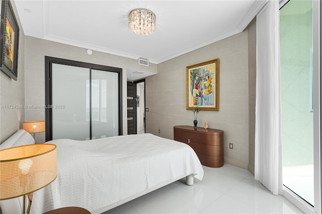 tiled bedroom with access to outside, a closet, crown molding, and a notable chandelier