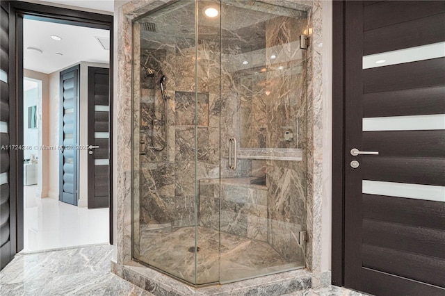 bathroom with an enclosed shower