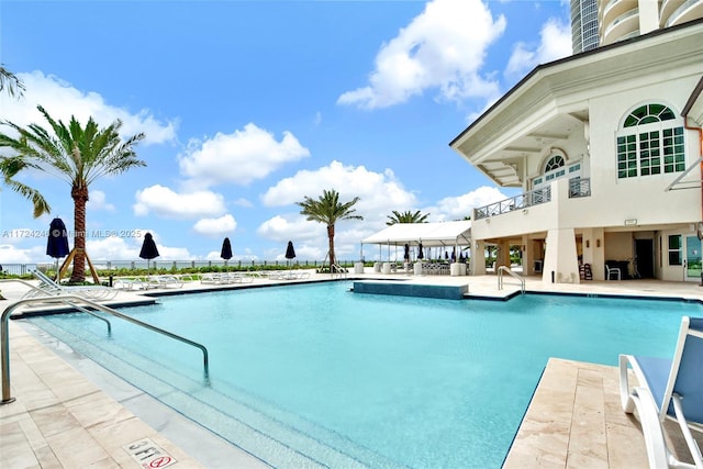 view of pool featuring a patio