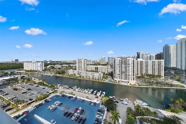 birds eye view of property featuring a water view