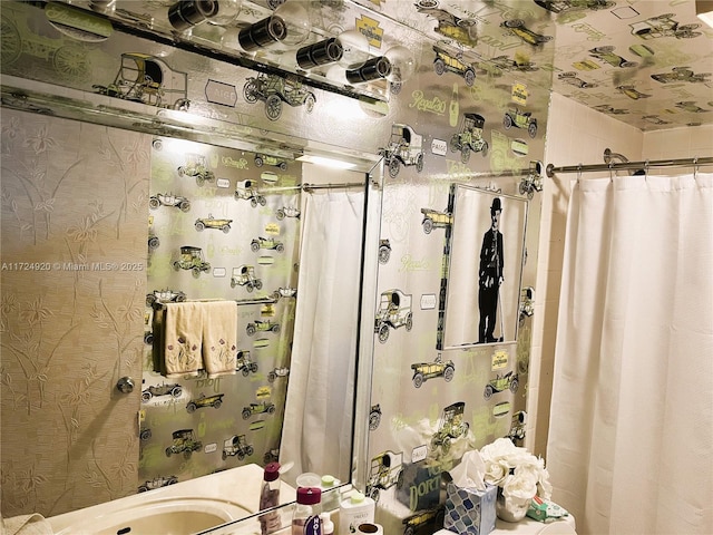 bathroom with a shower with shower curtain