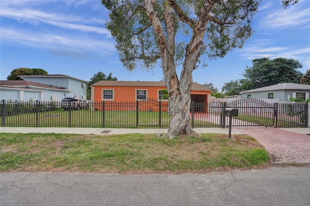 single story home with a front lawn