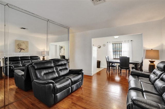 living room with hardwood / wood-style flooring