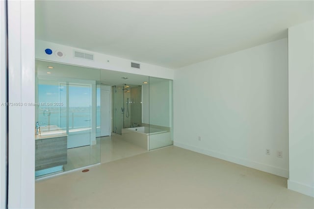 650 NE 32nd St Unit 2703, Miami, FL 33137 - unfurnished room featuring baseboards