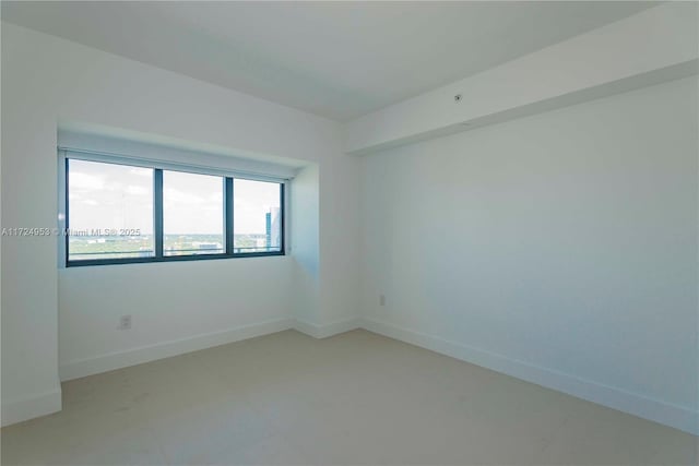 650 NE 32nd St Unit 2703, Miami, FL 33137 - unfurnished room featuring baseboards