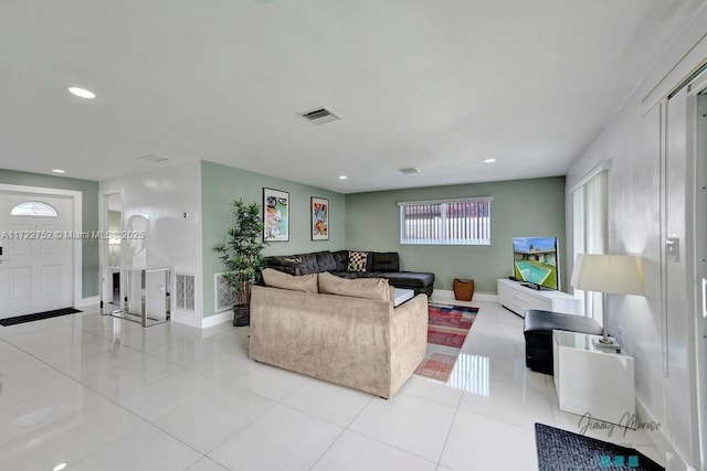 living room featuring light tile patterned floors