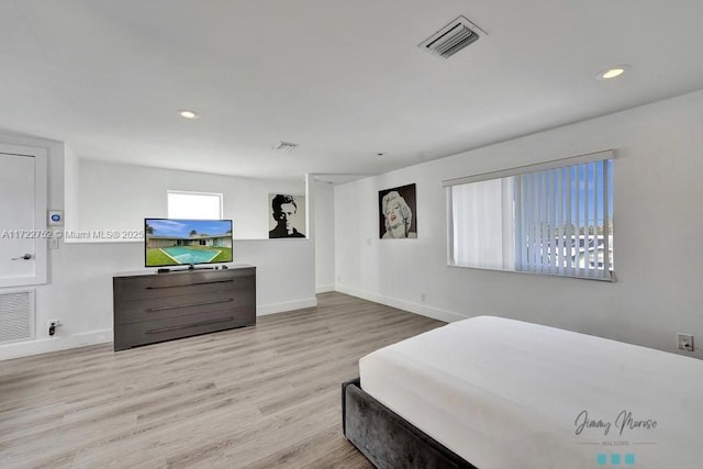 bedroom featuring light wood-type flooring