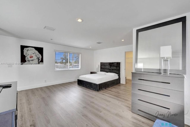 bedroom featuring light hardwood / wood-style flooring