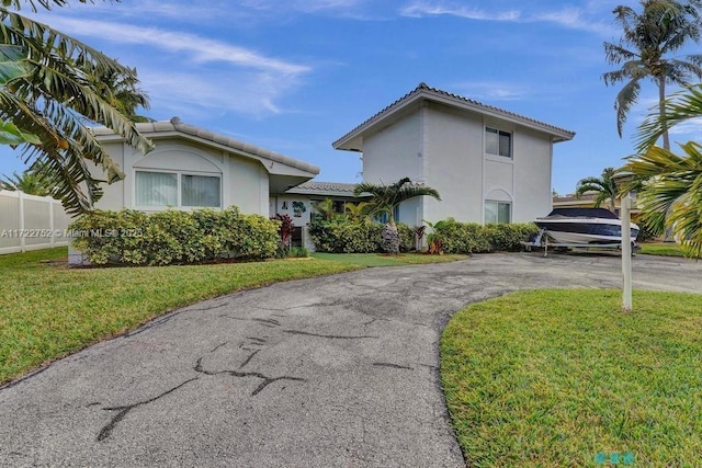 exterior space with a front lawn