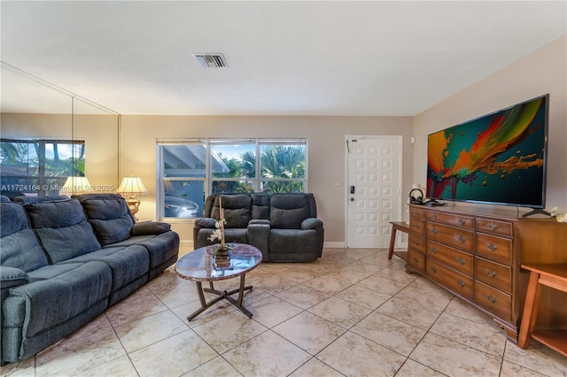 living room featuring light tile patterned floors