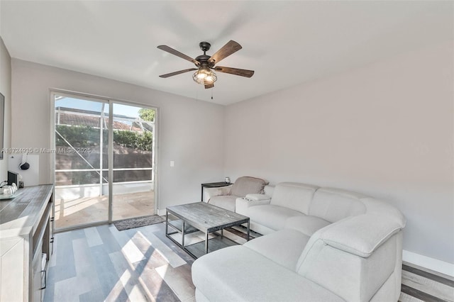 living room featuring ceiling fan