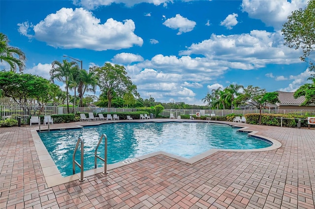 view of pool with a patio area