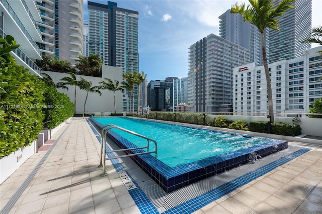 view of pool featuring a patio area