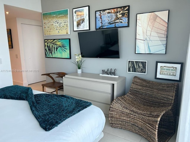 bedroom with light tile patterned flooring