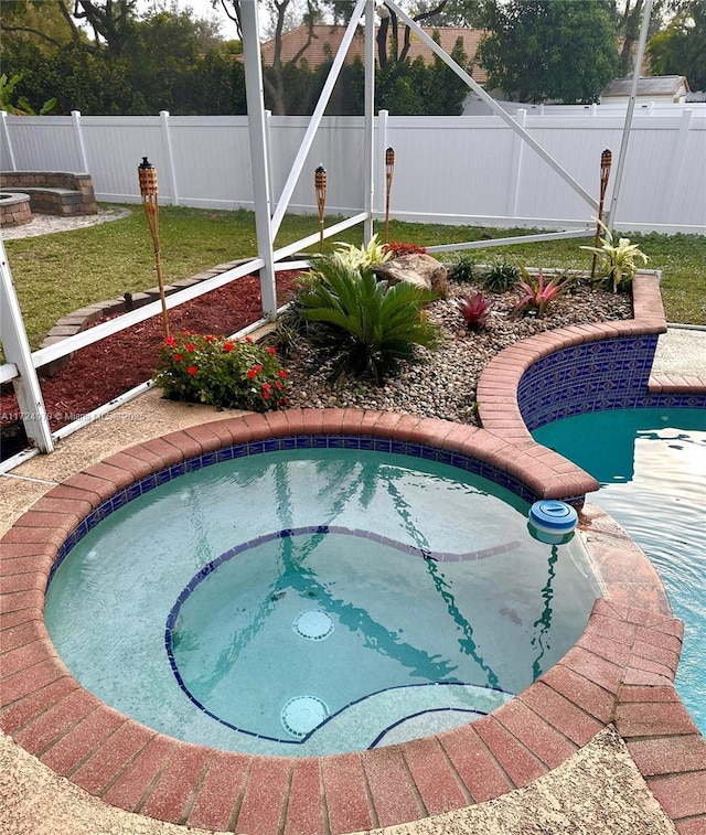 view of pool featuring a hot tub