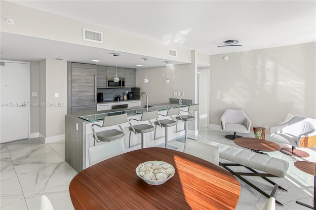 living room featuring sink