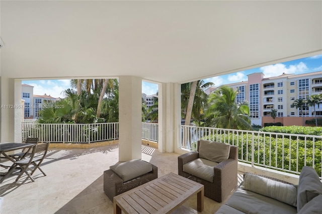 view of patio featuring a balcony