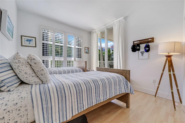 bedroom with light wood-type flooring