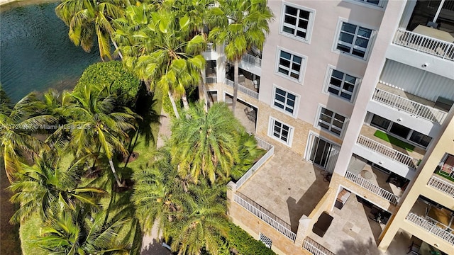 view of building exterior with a water view