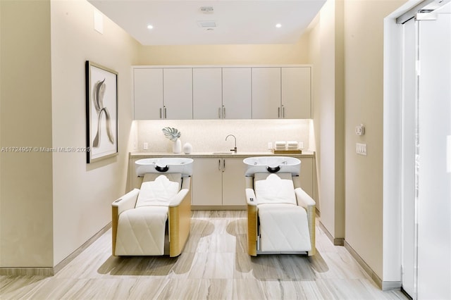 sitting room featuring sink