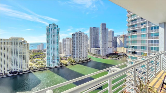 balcony featuring a water view