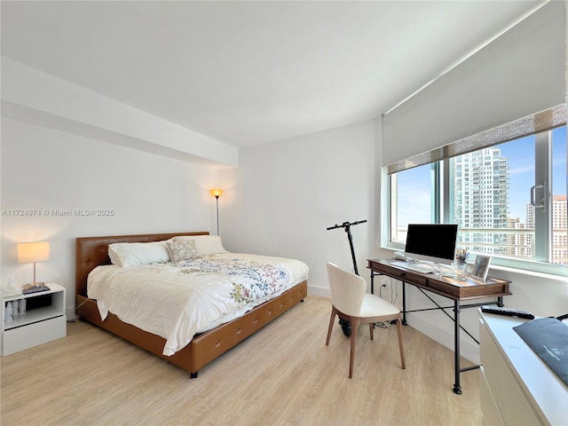 bedroom featuring light hardwood / wood-style floors