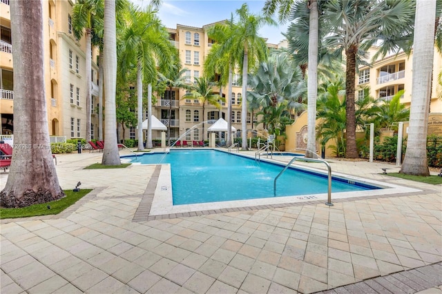 community pool featuring a patio