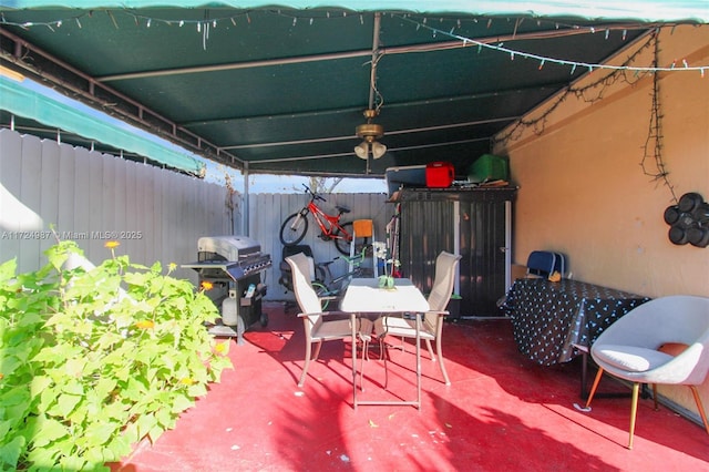 view of patio featuring a grill