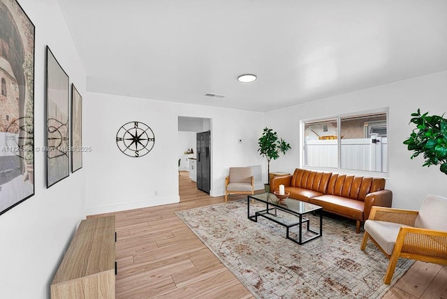 living room featuring light wood-type flooring