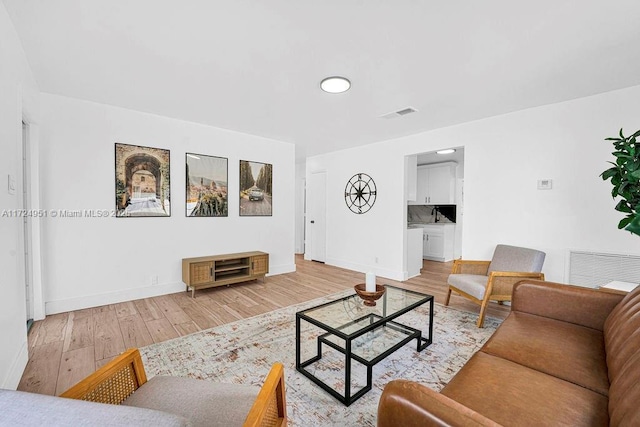 living room with light wood-type flooring