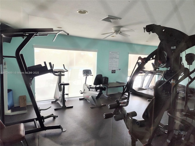 exercise room featuring ceiling fan