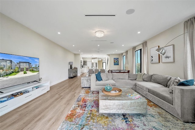 living room featuring light hardwood / wood-style floors