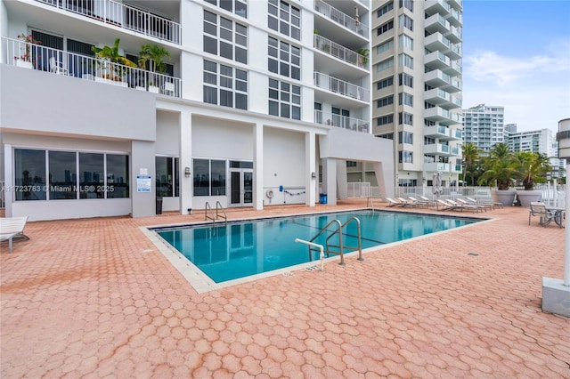 view of pool with a patio