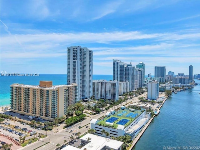 birds eye view of property featuring a water view