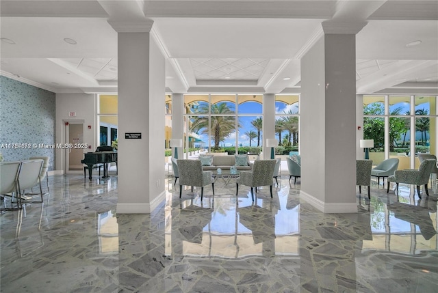 interior space with ornamental molding and a tray ceiling