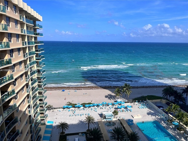 property view of water featuring a beach view