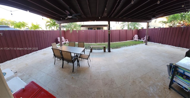 view of patio / terrace featuring ceiling fan