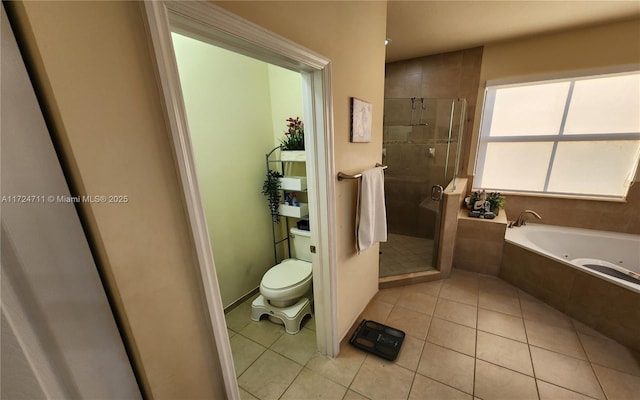 bathroom with toilet, separate shower and tub, and tile patterned floors