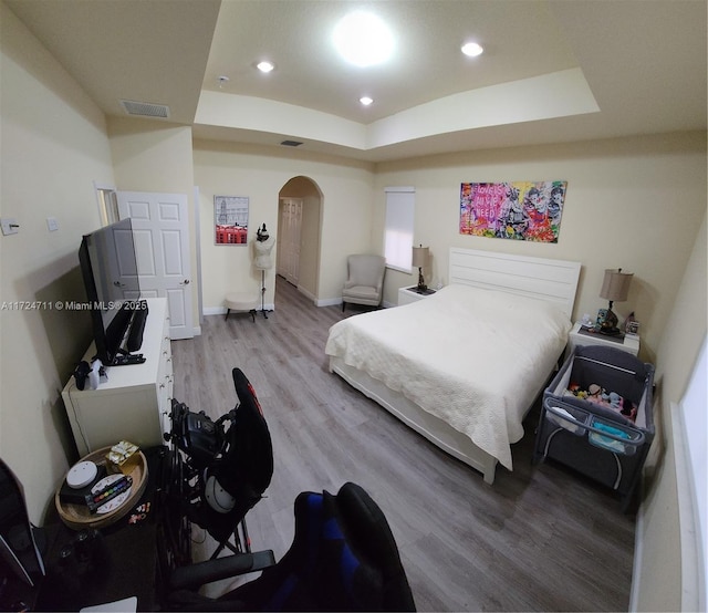 bedroom featuring hardwood / wood-style floors