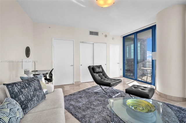 living room featuring expansive windows