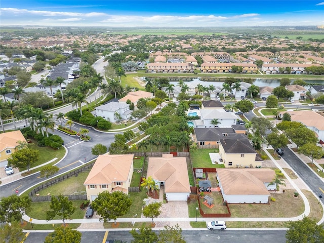 birds eye view of property with a residential view