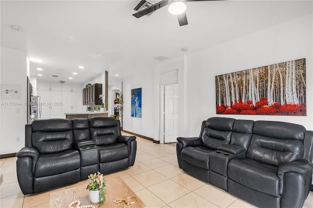 living area featuring ceiling fan, light tile patterned flooring, visible vents, and recessed lighting