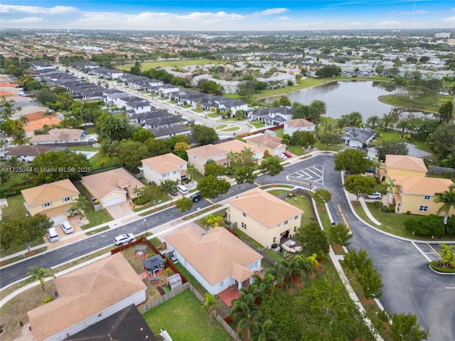 aerial view with a water view and a residential view