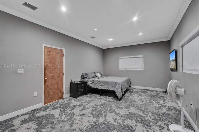 bedroom with crown molding and carpet floors