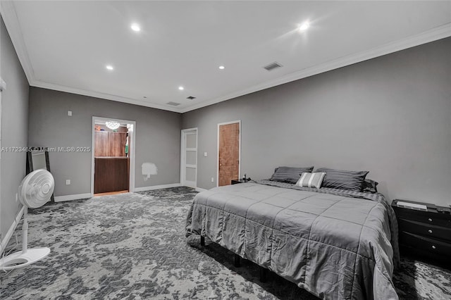 carpeted bedroom featuring crown molding